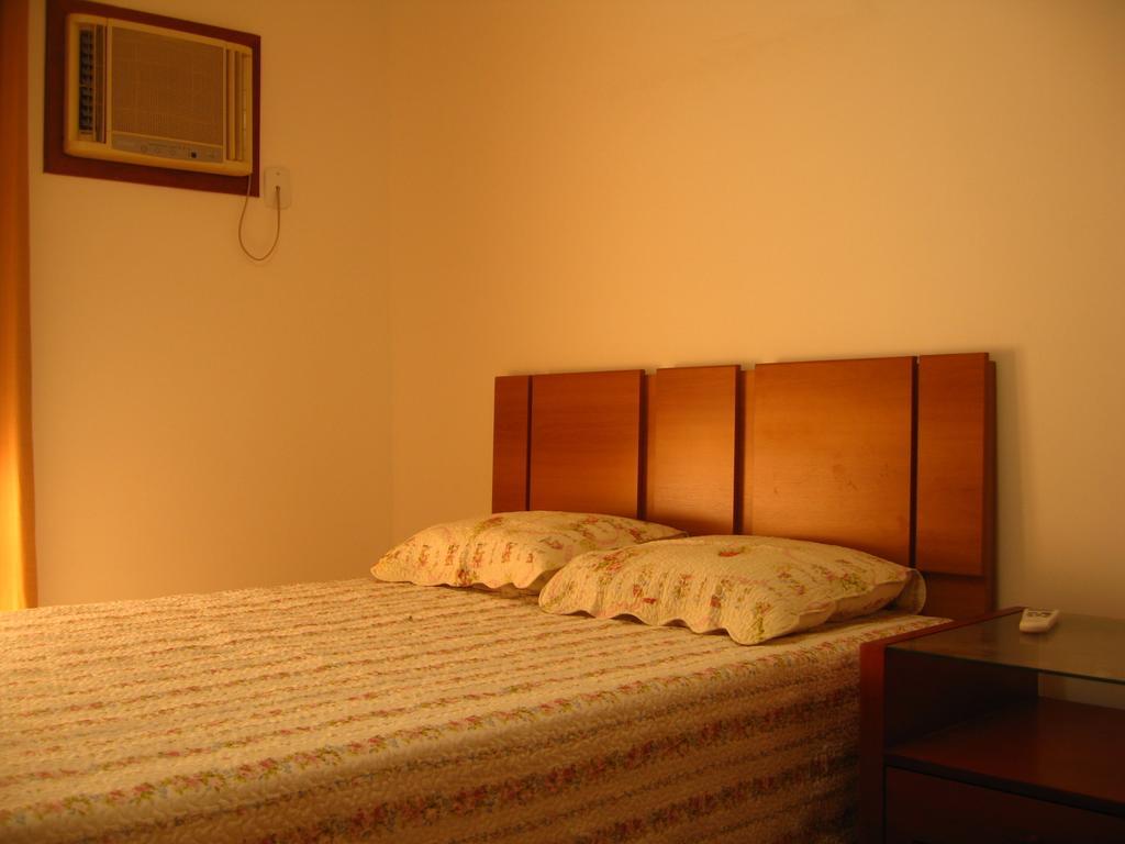 Quarto Triplo com Banheiro Privativo