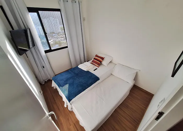 Quarto1 privativo em APTO Rio Centro Barra Olímpica - Com Anfitrião Room with host
