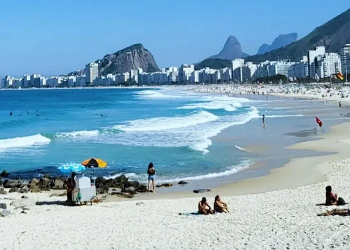 Copacabana pé na areia esquina com Avenida Atlântica