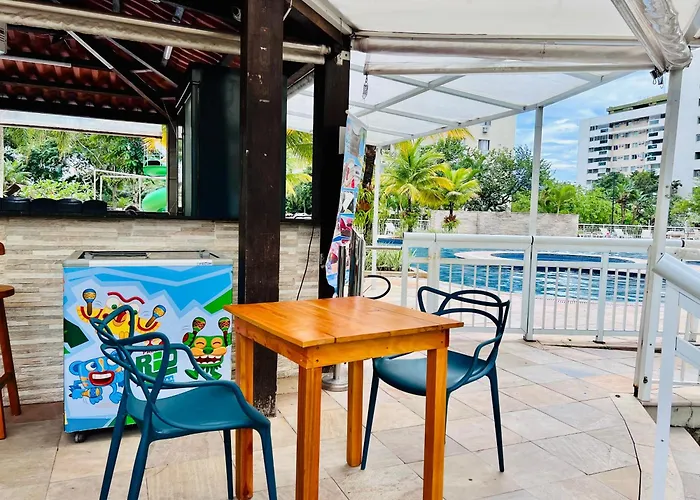 Apto 2 Quartos com Varanda em Frente ao RioCentro Barra Olimpica Wi-Fi Rapido Piscina Cozinha Completa e Estacionamento Portaria 24h Sala Homeoffice Brinquedoteca e Parquinho Infantil Ideal para Grupos Familias e Hospedes a trabalho