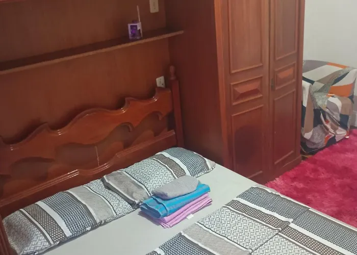 Quarto confortável e arejado