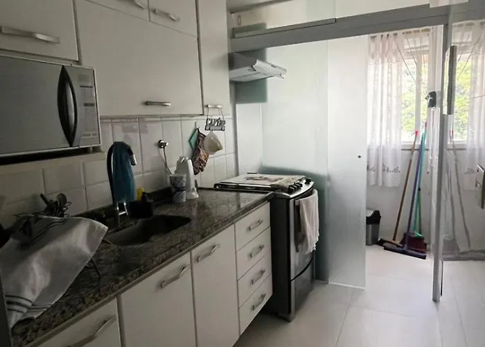 Apartamento com Quarto para hóspedes Rio Centro